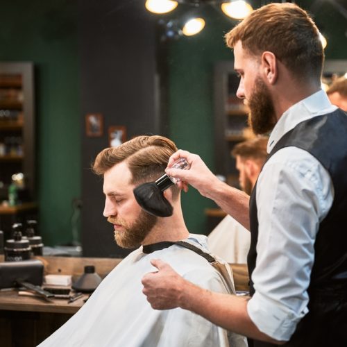 Ginger,Brutal,Man,Getting,Trendy,Haircut,While,Sitting,In,White